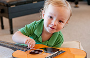 Little boy with a guitar