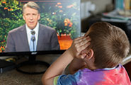 Boy watching General Conference