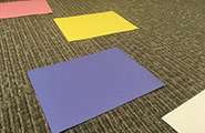 Squares of paper on the floor