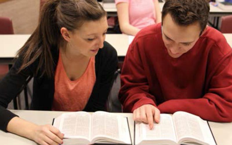 Students reading scriptures